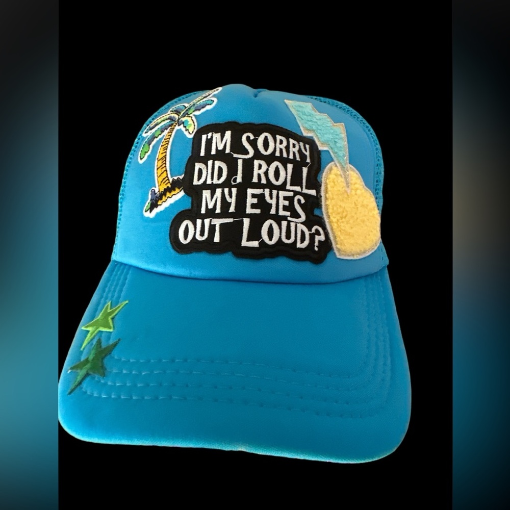 Trucker hat with embroidered patches